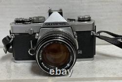Olympus OM-1 35mm SLR Camera with 50mm f1.4 Lens Working