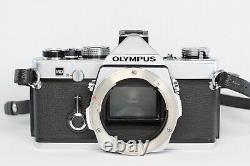 Olympus OM-1 Film Camera Silver & G. Zuiko Auto-W 28mm F3.5 75-150mm F4 Lens case