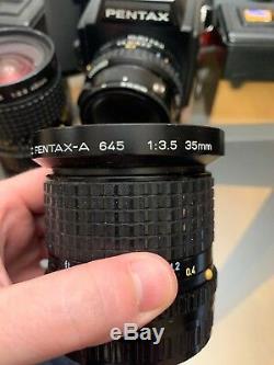 Pentax 645 Medium Format SLR Film Camera with 75mmLS lens Kit & 3 extra lenses