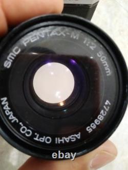 Pentax K1000 35mm Film Camera with SMC PENTAX-M 12 50 mm lens. READ WELL