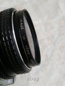 Pentax K1000 35mm Film Camera with SMC PENTAX-M 12 50 mm lens. READ WELL