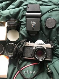 Pentax K1000 35mm SLR Film Camera with Lens SMC Pentax 12 50mm and acc