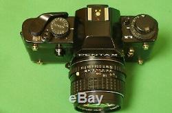 Pentax LX 35mm film SLR camera with SMC Pentax-M 50mm f/1.4 prime lens