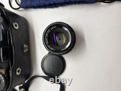 Pentax MV 35mm Film SLR Camera + SMC 28mm f/2.8 Lens + AF200S Flash + Case Kit