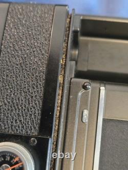 SCARCE MINOLTA SRM MOTOR DRIVE Film Camera ROKKOR lens SR-M COLLECTIBLE & WORKS