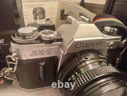 Vintage Canon AE-1 35mm SLR Camera 50mm f/1.4 Lens Auto Zoom Lens + Extras