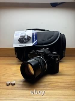 WORKING Nikon FM 35mm Film Camera (Black) withNikkor 135mm f2.8 AI-S-Free Shipping