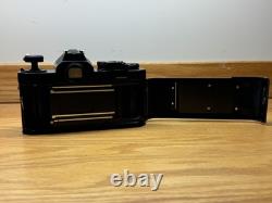 WORKING Nikon FM 35mm Film Camera (Black) withNikkor 135mm f2.8 AI-S-Free Shipping