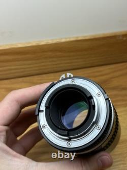 WORKING Nikon FM 35mm Film Camera (Black) withNikkor 135mm f2.8 AI-S-Free Shipping